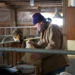 Pierre-Louis Monteillet Prepares Dinner for Farm Cat and Dog, Monteillet Farm Photo by Steve Scardina