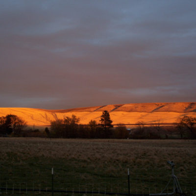 Photo of Sunset on the Distant Hills at Monteillet Fromagerie