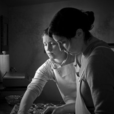 Photo of Interns Making Soft Cheese at Monteillet Fromagerie