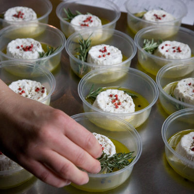reparing Provencal, a Soft Cheese with Rosemary. Photo by Steve Scardina