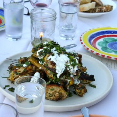 photo of beautiful plate of grilled chicken—2011 Outstanding in the Field Dinner—photo by The Farm Chicks