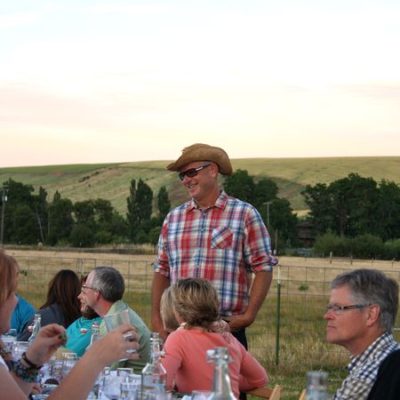 photo of the founder—2011 Outstanding in the Field Dinner—photo by The Farm Chicks